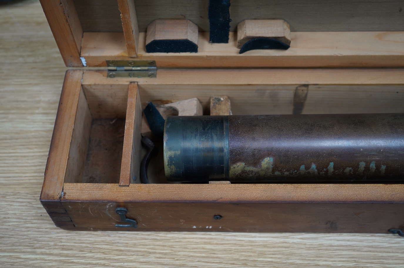 A First World War telescope gunsight by W. Watson & Sons Ltd., London, stamped S.S. Telescope x8 3348, and dated 1918, in its original pine case, sight 52cm long, case 68.5cm long. Condition - fair.